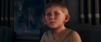 Movie still from “The Polar Express” (2004), directed by Robert Zemeckis – A young boy is looking into the distance; Close Up shot, High angle