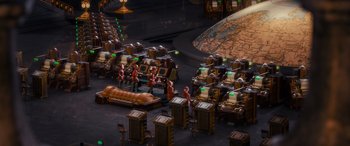 Movie still from “The Polar Express” (2004), directed by Robert Zemeckis – A group of people standing next to each other in a room; Extreme Wide shot, High angle