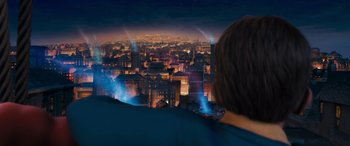 Movie still from “The Polar Express” (2004), directed by Robert Zemeckis – A person looking out over a city at night; Medium shot, Over the shoulder angle