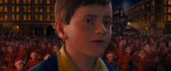 Movie still from “The Polar Express” (2004), directed by Robert Zemeckis – A boy's face in a crowd of people; Close Up shot, High angle