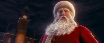 Movie still from “The Polar Express” (2004), directed by Robert Zemeckis – An old man dressed as santa claus with long white beard; Close Up shot, Low angle