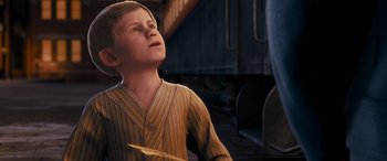 Movie still from “The Polar Express” (2004), directed by Robert Zemeckis – A young boy is looking up into the sky; Close Up shot, High angle