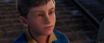 Movie still from “The Polar Express” (2004), directed by Robert Zemeckis – A young boy's face with yellow eyes; Close Up shot, High angle