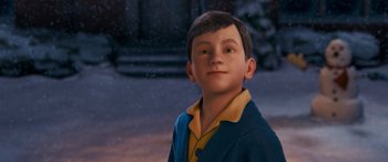 Movie still from “The Polar Express” (2004), directed by Robert Zemeckis – A young boy wearing a blue and yellow jacket; Close Up shot, High angle