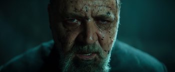 Movie still from “The Pope's Exorcist” (2023), directed by Julius Avery – An old man with a beard and a mustache; Close Up shot, Low angle