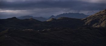 Movie still from “The Power of the Dog” (2021), directed by Jane Campion – A view of a mountain range in the distance; Extreme Wide shot, High angle