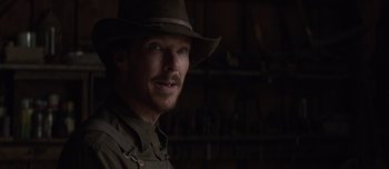 Movie still from “The Power of the Dog” (2021), directed by Jane Campion – A person wearing a hat; Close Up shot, Over the shoulder angle