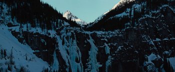Movie still from “The Prestige” (2006), directed by Christopher Nolan – A view of a snowy mountain from a cliff; Extreme Wide shot, Low angle