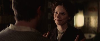 Movie still from “The Prestige” (2006), directed by Christopher Nolan – A woman in a black jacket is looking at a man; Close Up shot, Over the shoulder angle