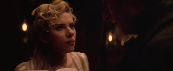 Movie still from “The Prestige” (2006), directed by Christopher Nolan – A man and a woman looking at one another; Close Up shot, Over the shoulder angle