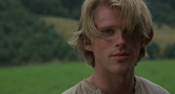 Movie still from “The Princess Bride” (1987), directed by Rob Reiner – A person with long blonde hair; Close Up shot, Over the shoulder angle