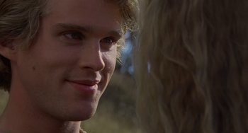 Movie still from “The Princess Bride” (1987), directed by Rob Reiner – A young man's face with long blonde hair; Close Up shot, Over the shoulder angle