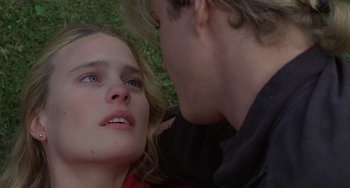 Movie still from “The Princess Bride” (1987), directed by Rob Reiner – A man and a woman laying in the grass; Close Up shot, Overhead angle