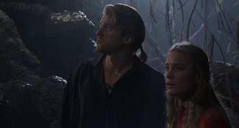 Movie still from “The Princess Bride” (1987), directed by Rob Reiner – A man and a woman standing next to each other in a forest; Close Up shot, Low angle