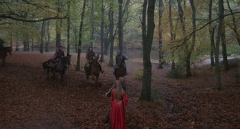 Movie still from “The Princess Bride” (1987), directed by Rob Reiner – A group of people riding horses through the woods; Extreme Wide shot, High angle