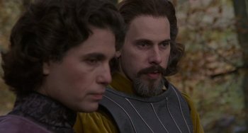 Movie still from “The Princess Bride” (1987), directed by Rob Reiner – Two men in medieval garb looking at the camera; Close Up shot, Over the shoulder angle
