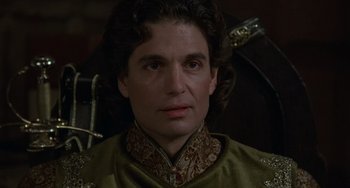 Movie still from “The Princess Bride” (1987), directed by Rob Reiner – A person wearing a green shirt; Close Up shot, High angle