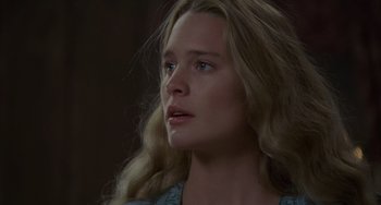 Movie still from “The Princess Bride” (1987), directed by Rob Reiner – A person with long blonde hair; Close Up shot, Over the shoulder angle