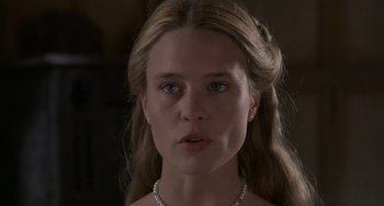 Movie still from “The Princess Bride” (1987), directed by Rob Reiner – A person wearing a pearl necklace; Close Up shot, Over the shoulder angle