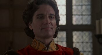 Movie still from “The Princess Bride” (1987), directed by Rob Reiner – A person wearing a red and yellow shirt; Close Up shot, Over the shoulder angle