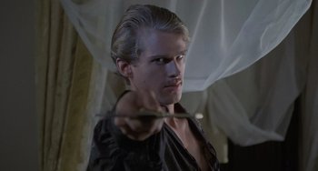 Movie still from “The Princess Bride” (1987), directed by Rob Reiner – A man holding a knife in his right hand; Close Up shot, Over the shoulder angle