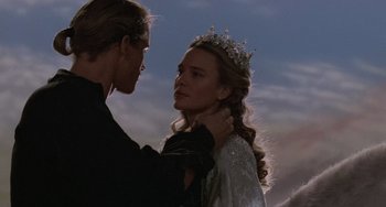 Movie still from “The Princess Bride” (1987), directed by Rob Reiner – A man and a woman are standing in front of each other; Close Up shot, Low angle