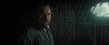 Movie still from “The Revenant” (2015), directed by Alejandro G. Iñárritu – A person wearing a shirt; Close Up shot, Low angle