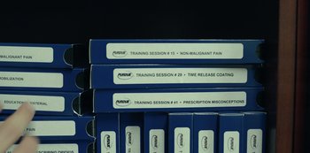 Movie still from “Dopesick” (2021), directed by Danny Strong – Extreme Close Up shot, Overhead angle