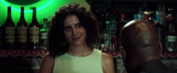 Movie still from “The Ritual Killer” (2023), directed by George Gallo – A person with curly hair; Close Up shot, Over the shoulder angle