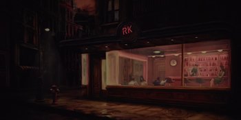 Movie still from “The School for Good and Evil” (2022), directed by Paul Feig – A painting of people sitting at a table in front of a building; Extreme Wide shot, High angle