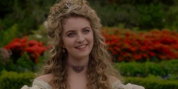 Movie still from “The School for Good and Evil” (2022), directed by Paul Feig – A beautiful young lady with long blonde hair wearing a tiara; Close Up shot, Over the shoulder angle
