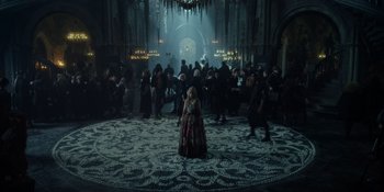 Movie still from “The School for Good and Evil” (2022), directed by Paul Feig – A group of people gathered in a large room; Extreme Wide shot, High angle