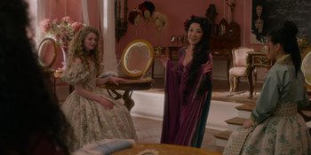 Movie still from “The School for Good and Evil” (2022), directed by Paul Feig – Two women dressed in period costumes in a room; Medium shot, Over the shoulder angle