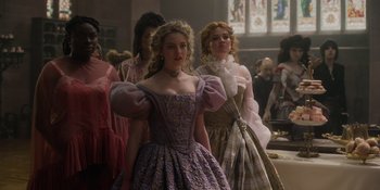 Movie still from “The School for Good and Evil” (2022), directed by Paul Feig – A group of people dressed in period costumes; Medium shot, Low angle