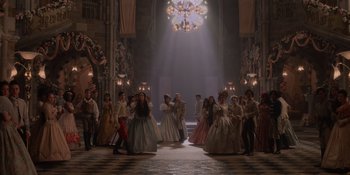 Movie still from “The School for Good and Evil” (2022), directed by Paul Feig – A group of people dressed in period costumes; Wide shot, High angle