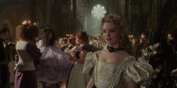 Movie still from “The School for Good and Evil” (2022), directed by Paul Feig – A group of people dressed in period clothing; Medium shot, Over the shoulder angle