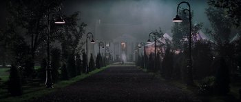 Movie still from “The Score” (2001), directed by Frank Oz – A path leading to a house in the middle of the night; Extreme Wide shot, Low angle