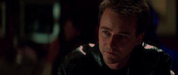 Movie still from “The Score” (2001), directed by Frank Oz – A person wearing a leather jacket; Close Up shot, Over the shoulder angle