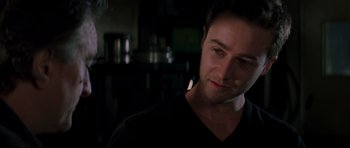 Movie still from “The Score” (2001), directed by Frank Oz – A person wearing a black shirt; Close Up shot, Over the shoulder angle