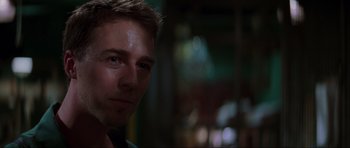 Movie still from “The Score” (2001), directed by Frank Oz – A man's face in a dark room; Close Up shot, Low angle