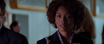 Movie still from “The Score” (2001), directed by Frank Oz – A person wearing a jacket; Close Up shot, Over the shoulder angle