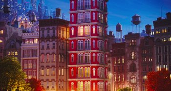 Movie still from “The Secret Life of Pets” (2016), directed by Chris Renaud – A tall red building in the middle of a city at night; Extreme Wide shot, Low angle