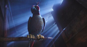 Movie still from “The Secret Life of Pets” (2016), directed by Chris Renaud – A bird is sitting on a branch in a room; Wide shot, Low angle