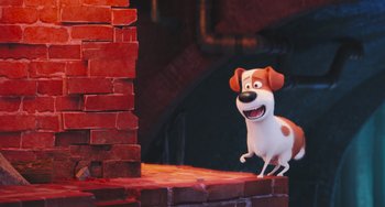 Movie still from “The Secret Life of Pets” (2016), directed by Chris Renaud – A dog standing on top of a red brick wall; Wide shot, Low angle