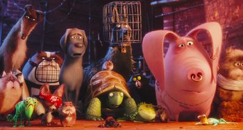 Movie still from “The Secret Life of Pets” (2016), directed by Chris Renaud – A group of stuffed animals with a cage on top of them; Wide shot, Low angle
