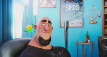 Movie still from “The Secret Life of Pets” (2016), directed by Chris Renaud – A man with a bald head is sitting in a chair; Close Up shot, Over the shoulder angle