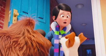 Movie still from “The Secret Life of Pets” (2016), directed by Chris Renaud – A woman in a scarf and a dog in a room; Close Up shot, Over the shoulder angle