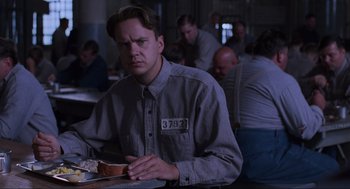 Movie still from “The Shawshank Redemption” (1994), directed by Frank Darabont – Medium shot, Over the shoulder angle