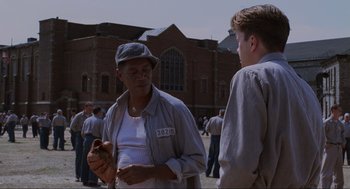 Movie still from “The Shawshank Redemption” (1994), directed by Frank Darabont – Medium shot, Over the shoulder angle
