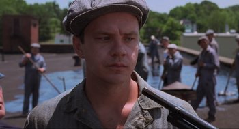 Movie still from “The Shawshank Redemption” (1994), directed by Frank Darabont – Close Up shot, Over the shoulder angle